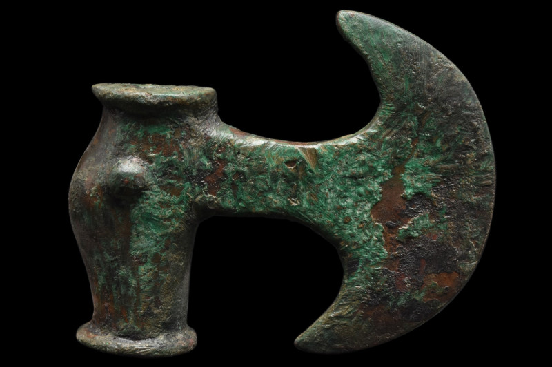 BRONZE AGE BRONZE AXE HEAD
Ca. 1200-700 BC. A cast bronze axe head comprising o...