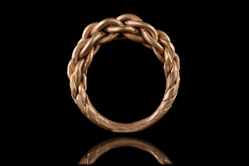 VIKING GOLD TWISTED RING
Ca. 900-1100 AD. An amazing finger ring formed of rods...