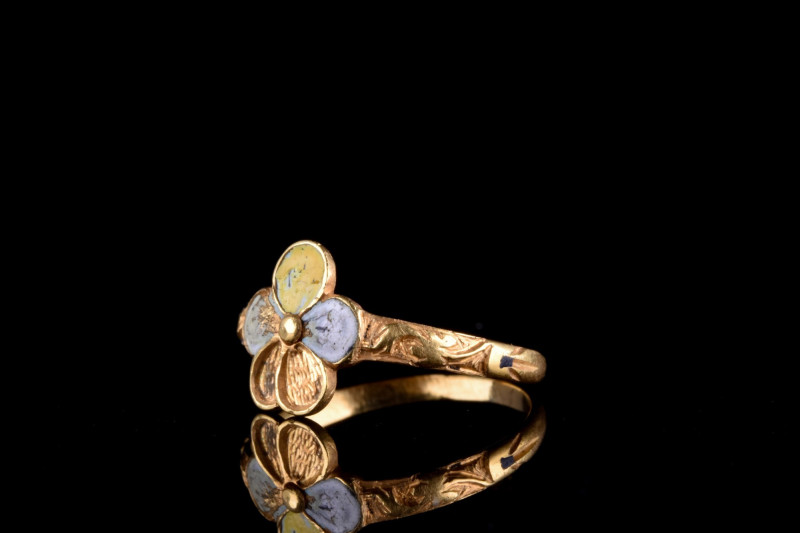 POST-MEDIEVAL GOLD AND GARNET RING
Ca. 1600-1700 AD. A gold finger ring with th...