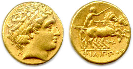 ROYAUME DE MACÉDOINE - PHILIPPE II 359-336
Tête laurée d'Apollon. Derrière la nuque, A. R/. Bige de chevaux conduit au galop par un aurige. 
Dessous...