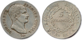 CONSULAT 9 novembre 1799 - 18 mai 1804 
5 Francs argent (tête de Bonaparte) an 12 Paris. (25,00 g) 
♦ Gad 579 
Flan lustré. Petit coup sur la tranc...
