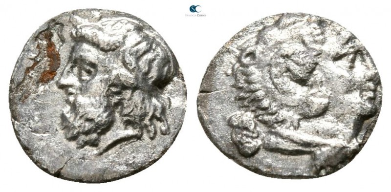 Sicily. Gela 339-310 BC. 
Litra AR

7mm., 0,49g.

Head of Herakles right, w...