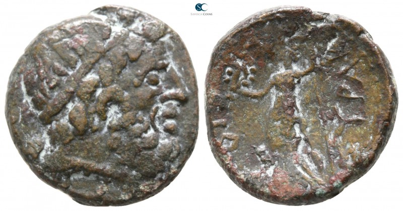 Sicily. Syracuse. Time of Roman Rule. 212 BC. 
Bronze Æ

17mm., 6,10g.

Hea...