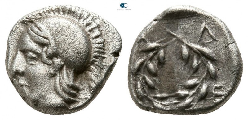 Aeolis. Elaia 450-400 BC. 
Trihemiobol AR

8mm., 1,28g.

Helmeted head of A...