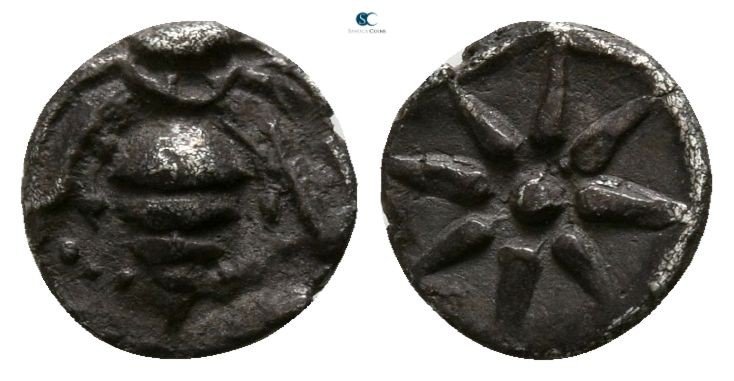 Ionia. Ephesos circa 500-420 BC. 
Hemiobol AR

5mm., 0,28g.

Bee / Star of ...
