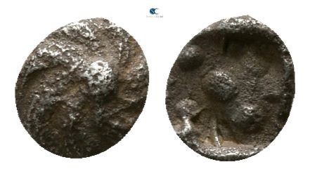 Ionia. Uncertain mint circa 520-480 BC. 
Hemitetartemorion AR

3mm., 0,08g.
...