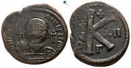 Justinian I. AD 527-565. Dated RY 12=AD 538/9. Constantinople. Half follis Æ