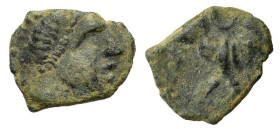 Spain, Castulo, late 2nd century BC. Æ Sextans ? (14mm, 1.07g). Diademed male head r. R/ Bull advancing r., head facing; crescent above. ACIP 2172. Go...
