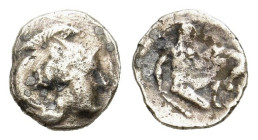 Southern Apulia, Tarentum, c. 380-325 BC. AR Diobol (11mm, 0.90g). Helmeted head of Athena r., helmet decorated with hippocamp. R/ Herakles kneeling r...