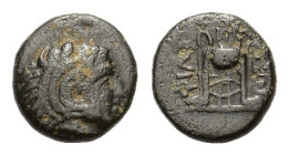 Macedon, Philippoi, c. 356-345 BC. Æ (10mm, 1.24g). Head of Herakles r., wearing lion skin. R/ Tripod. HGC 3.1, 634. Near VF