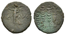 Macedon, Philippi, c. AD 41-68. Æ (20mm, 3.70g). Nike standing l. on base, holding wreath and palm. R/ Three standards. RPC I 1651; SNG Copenhagen 305...