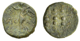 Macedon, Philippi, c. AD 41-68. Æ (16mm, 3.60g). Nike standing l. on base, holding wreath and palm. R/ Three standards. RPC I 1651; SNG Copenhagen 305...