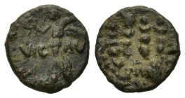 Macedon, Philippi, c. AD 41-68. Æ (17mm, 3.20g). Nike standing l. on base, holding wreath and palm. R/ Three standards. RPC I 1651; SNG Copenhagen 305...