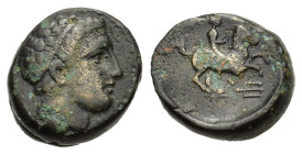 Kings of Macedon, Philip II (359-336 BC). Æ (17mm, 6.50g). Uncertain mint in Macedon. Diademed head of Apollo r. R/ Youth on horseback riding r.; trid...