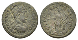 Elagabalus (218-222). Ionia, Ephesus. Æ (22mm, 6.60g). Laureate, draped and cuirassed bust r. R/ Tyche standing l., holding cornucopia and statuette o...