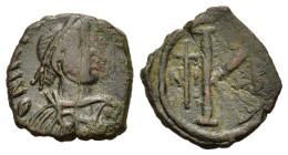 Justinian I. 527-565. Æ 20 Nummi (23mm, 7.90g). Nicomedia, 527-538. Diademed, draped and cuirassed bust r. R/ Large K; to l., crossed flanked by N I a...