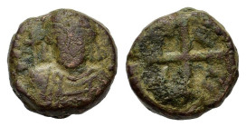 Maurice Tiberius (582-602). Æ 10 Nummi (14mm, 4.00g). Syracuse, 588-602. Helmeted, draped and cuirassed bust facing, holding long cross. R/ Large X; S...