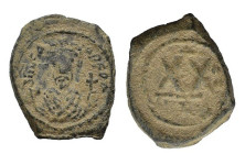 Phocas (602-610). Æ 20 Nummi (19mm, 4.60g). Constantinople, 603-610. Crowned bust facing, wearing consular robes, holding mappa and cross. R/ Large XX...