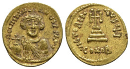 Constans II (641-668). AV Solidus (21mm, 4.46g, 7h). Constantinople, 641-646. Crowned bust facing, wearing chlamys, holding globus cruciger. R/ Cross ...