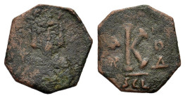 Constantine IV (668-685). Æ 20 Nummi (18mm, 2.40g). Syracuse, 674-681. Helmeted and cuirassed facing bust, holding globus cruciger. R/ Large K; cross ...