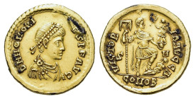 Honorius (393-423). Plated? AV Solidus (21mm, 4.00g). Diademed, draped and cuirassed bust r. R/ Emperor standing r., holding labarum and victory on gl...