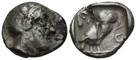 Attica. Athens circa 454-404 BC. Tetradrachm AR (21mm, 16.9 g). Head of Athena right, wearing earring, necklace, and crested Attic helmet decorated wi...