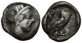 ATTICA Tetradrachm, about 530-500 BC. AR (24mm, 13 g). Head of Athena r., wearing crested Attic helmet and disc-shaped earring. Rev. ΑΘΕ? Owl standing...