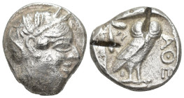 Attica. Athens circa 454-404 BC. Tetradrachm AR (22mm, 16 g). Head of Athena right, wearing earring, necklace, and crested Attic helmet decorated with...