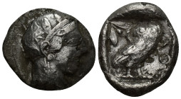 ATTICA Tetradrachm, about 530-500 BC. AR (24mm, 12.6 g). Head of Athena r., wearing crested Attic helmet and disc-shaped earring. Rev. ΑΘΕ Owl standin...
