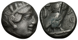 Attica. Athens circa 454-404 BC. Tetradrachm AR (20mm, 14.3 g). Head of Athena right, wearing earring, necklace, and crested Attic helmet decorated wi...