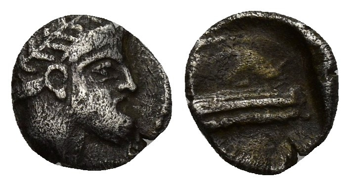 Phoenicia, Arados AR Obol. (9mm, 0.8 g) Circa 380-350. Laureate head of Ba'al-Ar...