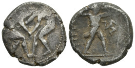 Pamphylia, Aspendos. Silver Stater (22.6mm, 10.7 g), ca. 400-380 BC. Two wrestlers grappling. rev. [EΣ]TFEΔIIY[Σ], slinger in throwing stance right; i...