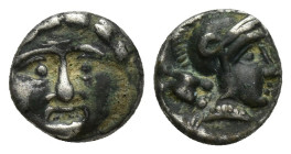 Pisidia, Selge. AR Obol (9mm, 0.8 g) (Circa 350-300 BC). Obv: Facing gorgoneion. Rev: Helmeted head of Athena to right; astragalos behind.