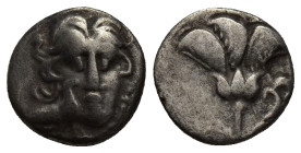 CARIA, Mylasa. 189-130 BC. AR Pseudo-Rhodian Drachm (12mm, 2.1 g). Head of Helios with eagle on cheek / Rose.