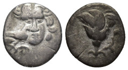 CARIA, Mylasa. 189-130 BC. AR Pseudo-Rhodian Drachm (14mm, 2 g). Head of Helios with eagle on cheek / Rose.
