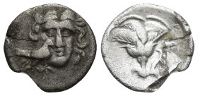 CARIA, Mylasa. 189-130 BC. AR Pseudo-Rhodian Drachm (15mm, 2 g). Head of Helios with eagle on cheek / Rose.