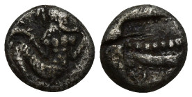 PHOENICIA, Arados. Uncertain king. Circa 440-420 BC. AR Third Stater – Tetrobol (12mm, 2.5 g). Ba'al-Arwad right, holding dolphin in each hand / Galle...