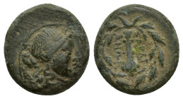 Lydia, Sardes Æ (14mm, 3 g) Circa 133 BC-AD 1. Laureate head of Apollo to right / Club; ΣΑΡΔΙ-ΑΝΩΝ across fields, monogram below; all within laurel wr...