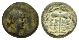 PHRYGIA, Abbaitis. 2nd-1st centuries BC. Æ (13mm, 3.2 g). Laureate head of Apollo right / Labrys (double-axe); monogram to left; allwithin wreath.