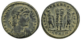 Constantine I (307/310-337). Æ Follis (18mm, 3 g). Constantinople, 330-3. Rosette-diademed, draped and cuirassed bust r. R/ Two soldiers flanking two ...