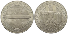 Weimarer Republik.

 5 Reichsmark (Silber). 1930 F. Stuttgart.
Auf den Weltflug des Luftschiffes Graf Zeppelin 1929.

Vs: Luftschiff vor Globus....