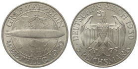 Weimarer Republik.

 3 Reichsmark (Silber). 1930 D. München.
Auf den Weltflug des Luftschiffes Graf Zeppelin 1929.

Vs: Luftschiff vor Globus.
R...