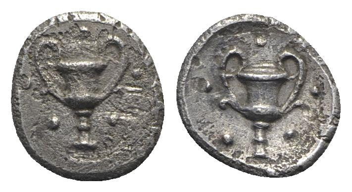 Southern Apulia, Tarentum, c. 280-228 BC. AR Obol (9mm, 0.58 g, 5h). Kantharos; ...