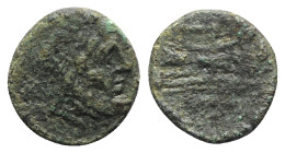 Northern Lucania, Paestum, c. 2nd century BC. Æ Semis (14mm, 3.48g, 6h). Laureate head of Saturn r. R/ Prow r.; AVF monogram above. Crawford 21/1; HNI...