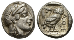 Attica, Athens, c. 454-404 BC. AR Tetradrachm (22,22 mm, 17,19 g). Head of Athena right, wearing crested Attic helmet decorated with three olive leave...