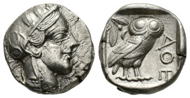 Attica, Athens, c. 454-404 BC. AR Tetradrachm (22,8 mm, 17,18 g). Head of Athena right, wearing crested Attic helmet decorated with three olive leaves...