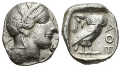 Attica, Athens, c. 454-404 BC. AR Tetradrachm (22,9 mm, 16,92 g). Head of Athena right, wearing crested Attic helmet decorated with three olive leaves...
