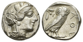 Attica, Athens, c. 454-404 BC. AR Tetradrachm (23,2 mm, 17,21 g). Head of Athena right, wearing crested Attic helmet decorated with three olive leaves...