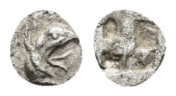 Ionia, Teos, late 6th-early 5th century BC. AR Tetartemorion (6mm, 0.15g). Head of griffin r. R/ Four-part incuse square. SNG Copenhagen Supp. 339. VF