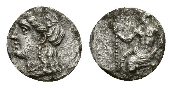 Cilicia, Nagidos, c. 400-380 BC. AR Obol (10mm, 0.81g). Baal seated left on thro...